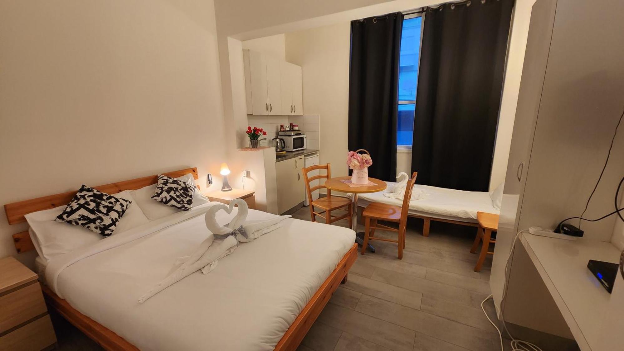 David Hameleh House Aparthotel Netanja Kamer foto